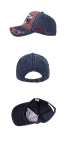 Close-up of washed cotton baseball cap featuring shark embroidery and adjustable metal buckle