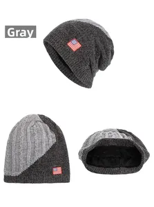 Detail view of the thick black fleece lining inside the grey knit American flag beanie