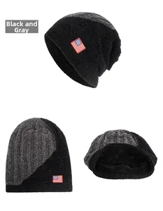 Detail view of black and grey knit beanie with American flag patch and thick lining