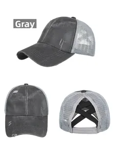 Detail of grey washed baseball cap with criss-cross elastic bands for ponytails