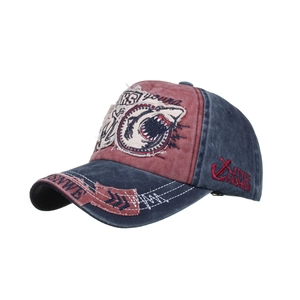 Vintage navy and red washed cotton baseball cap with shark embroidery and distressed details