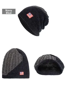 Detail of navy blue chenille knit beanie with US flag patch and fleece lining