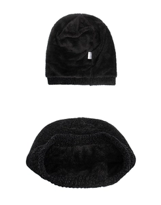 Detail of black chenille knit beanie showing thick thermal fleece lining and soft texture