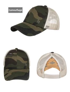 Detail view of camouflage ponytail baseball cap with criss-cross elastic bands and mesh back