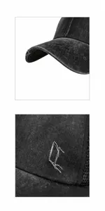 Detailed view of the vintage washed fabric and distressed edges on this baseball cap