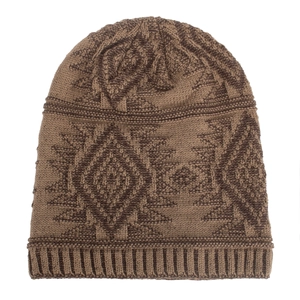 Winter dark brown knitted beanie hat featuring a geometric diamond jacquard pattern