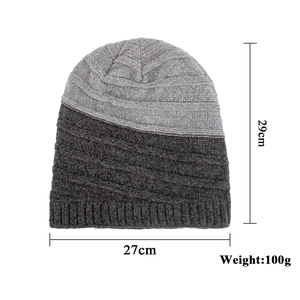 Two-tone chenille knit beanie in light and dark grey colors with ribbed texture