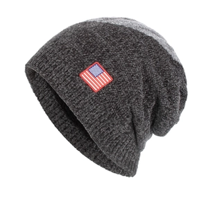 Slouchy dark grey chenille knit beanie with a US flag patch for casual winter warmth