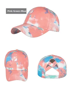 Detailed views of tie-dye ponytail baseball cap with criss-cross elastic back bands