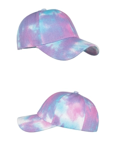 Detailed view showing tie-dye pattern on cotton baseball caps in pink and blue tones