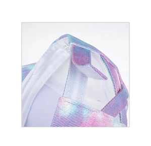 Detail view of tie-dye baseball cap back with adjustable velcro strap and cotton label