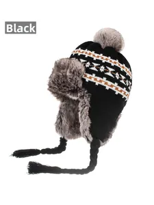 Detail of knitted winter ushanka hat with geometric patterns and grey faux fur lining