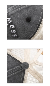 Detail of grey washed denim baseball cap with 3D embroidery and breathable beige mesh