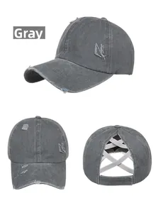 Detail of grey washed cotton baseball cap with criss-cross elastic bands for ponytails