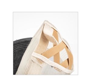 Detail of the cross elastic bands for ponytails and velcro strap on the baseball cap