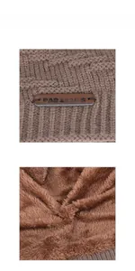 Détail du bonnet en tricot d'hiver avec doublure polaire chaude et patch logo en cuir