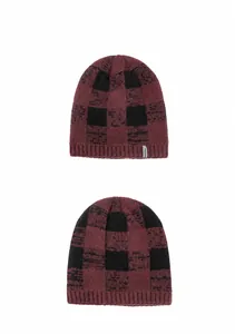Detailed knit texture of burgundy and black checkered beanie with FASHION label