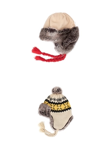 Detail of winter trapper hats featuring faux fur lining and geometric knit patterns