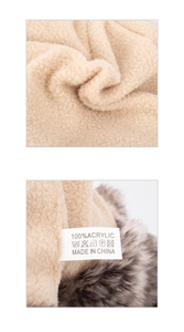 Detail view of 100% acrylic knit hat with soft fleece lining and faux fur trim