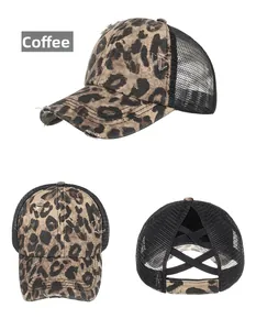 Close-up of leopard print mesh ponytail baseball cap with elastic criss-cross back detail