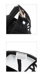 Detail view of the mesh baseball cap showing 65% cotton fabric label and leopard velcro strap