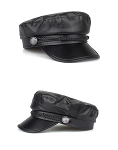 Detail of black PU leather baker boy hat featuring braided rope and silver buttons
