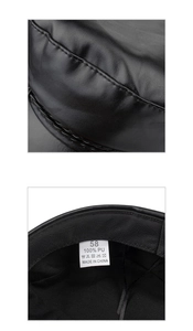 Detailed close-up of the black PU leather beret showing texture and size 58 label