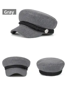Three-view display of a grey wool newsboy hat with black cord and silver buttons