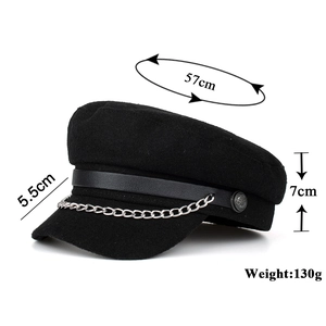 Classic black wool newsboy cap with silver chain belt and anchor embossed metal button