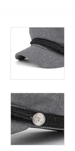 Detail of grey wool newsboy hat featuring black woven rope and silver anchor button trim
