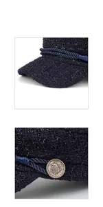 Detailed macro view of navy blue tweed fabric with silver metallic threads and golden button