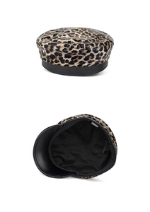 Close-up detail of leopard print PU leather beret showing inner lining and stitching