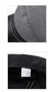 Detailed macro view of gray newsboy hat lining and wash label with size 57 info