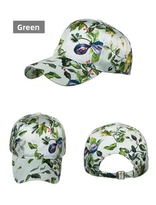 Three-view detail of green satin baseball cap with vintage floral and fruit print