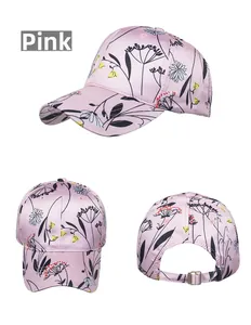 Detailed views of the pink floral baseball cap showing its metal adjustable buckle and pattern