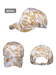 Detail view of the floral print pattern and adjustable metal buckle on the white baseball cap
