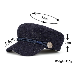 Dark blue tweed newsboy cap with gold button and braided strap detail, size 57cm