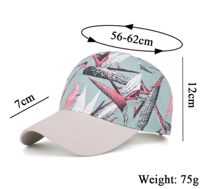 Detail view of tropical print baseball cap showing dimensions 56-62cm and 7cm brim