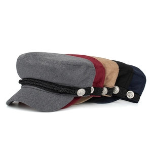 Nautical style baker boy hats in five colors with anchor buttons and braided trim
