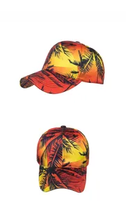 Detail of tropical sunset print baseball cap with palm tree silhouettes and curved brim