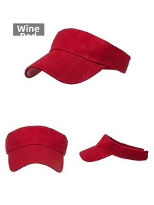 Detail view of burgundy sun visor hat with embossed SPORT pattern and open top design