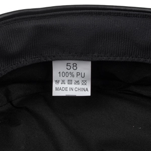 Detail view of winter PU leopard beret inner lining with size 58 and material tag