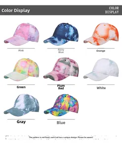 Flat lay display of colorful tie-dye canvas baseball caps in eight distinct color patterns