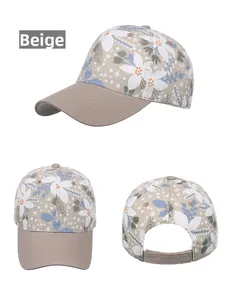 Three perspectives of a beige floral baseball cap with blue leaves and adjustable back strap