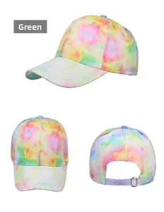Detail view of tie-dye baseball cap showing adjustable metal buckle and vibrant cotton fabric