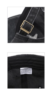 Dettaglio della fibbia in bronzo e dell'etichetta 100% cotone sul cappello lavato