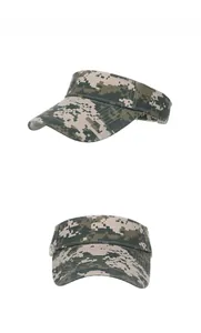 Detail view of digital camouflage sun visor with pixelated pattern and curved brim