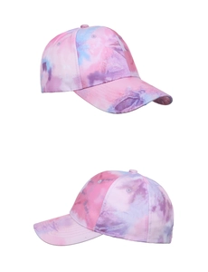 Detailed macro view of the colorful tie-dye patterns and texture on a cotton baseball cap
