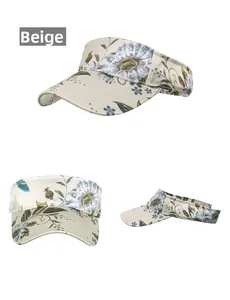 Three-view detail of beige visor hat with vintage blue and gold floral patterns