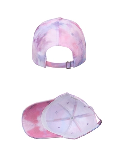 Detail view of tie-dye baseball cap featuring metal buckle adjustment and inner sweatband